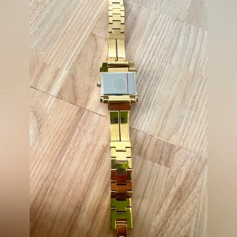 Rare Bulova ladies rectangular gold tone diamond dress watch NEW BATTERY